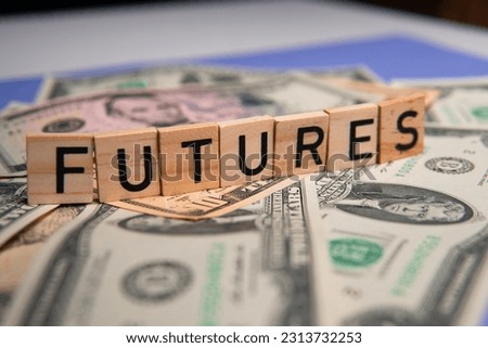 inscription futures next to dollars. Concept showing futures contracts Royalty-Free Stock Photo #2313732253