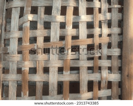 Woven bamboo strung together to form a rigid object, for backgrounds or screensavers.