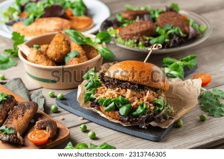 Variety of plant based meat, food to reduce carbon footprint Royalty-Free Stock Photo #2313746305
