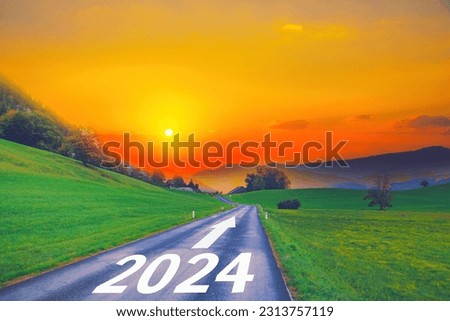 Open empty road path end and new year 2024. Upcoming 2024 goals and leaving behind 2023 year. passing time future, life plan change, work start run line, sunset hope growth begin, go forward concept. Royalty-Free Stock Photo #2313757119