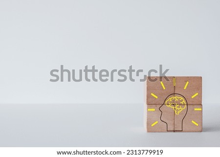 New Creative idea or inspiration,Critical Thinking,Learn new skill concept.,Wooden cubes stack in right corner with human head icon over white background use for abstract,business idea. Royalty-Free Stock Photo #2313779919