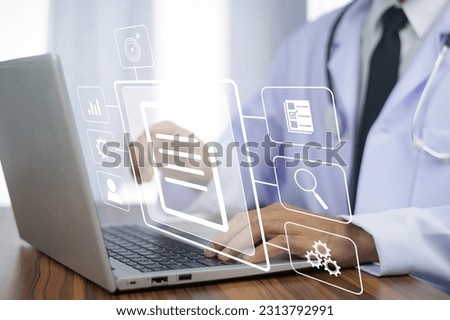 Doctor using computer Document Management System (DMS), online documentation database process automation to efficiently manage files	