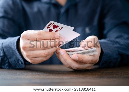 Shuffle the cards gambling  poker cards in casino and casino chips poker table game business gambling concept