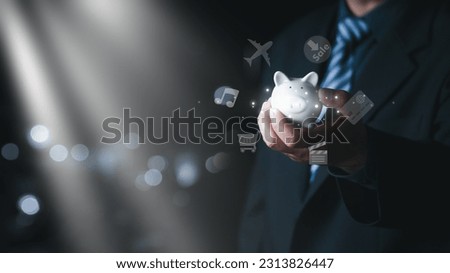 Business concept Close up of man using piggy bank and infographic icon of community technology digital.Concept of hi tech and big data,  Save money concept.