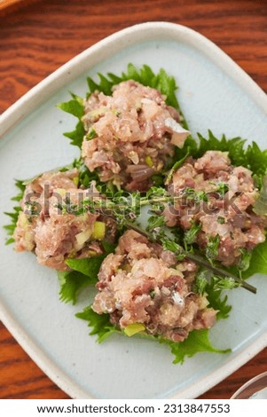 “Namerou” a traditional Japanese fish dish: raw horse mackerel minced and mixed with miso paste and condiments.