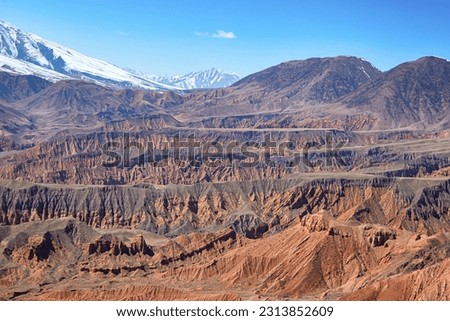 Beautiful view of cliffs from yellow red limestone. Konochek, Kyrgyzstan.