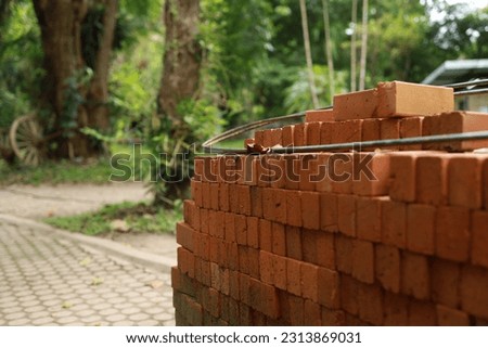 Pallet a red brick building material stack of new red bricks for construction