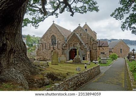                                St Brelade's Church On St Brelade's Bay, Jersey, Channel Islands, UK Royalty-Free Stock Photo #2313894059