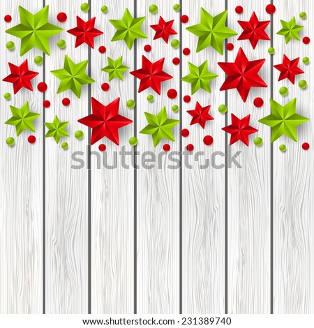 Xmas starry decorations on white wooden background