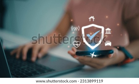 Insurance concept, Women using mobile phone buy insurance online for home insurance, life insurance, car, Travel, health, and life insured Royalty-Free Stock Photo #2313899119