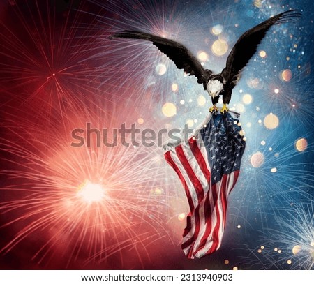 Eagle With American Flag Flies In The Fireworks With Abstract Bokeh Lights - Independence Day Royalty-Free Stock Photo #2313940903