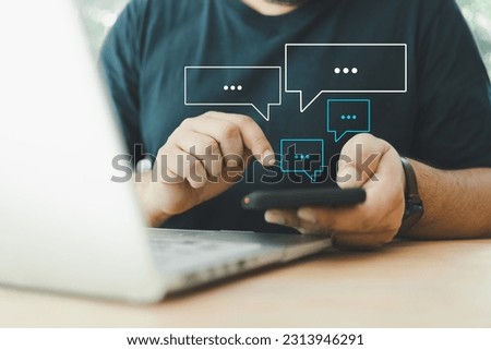 Men using smartphones type live chat chatting and social network concepts, chatting conversation working at home in chat box icons pop up. Social media marketing technology concept.