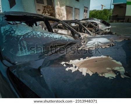 Burnt new car. burnt metal texture, metallic background.