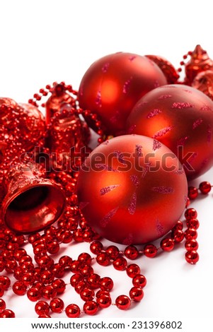 red christmas ornaments with balls and bells