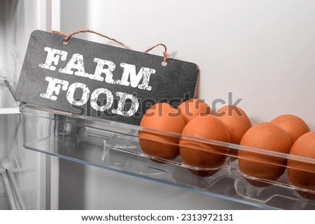 Farm Food Concept. Chicken eggs in the fridge.