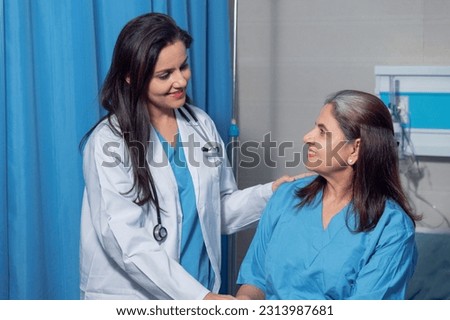 Doctor helping and support to patient while medical examination. trust and ethic concept. Royalty-Free Stock Photo #2313987681