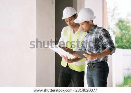 architect team on construction site inspection documents and business workflow in the morning. Royalty-Free Stock Photo #2314020377