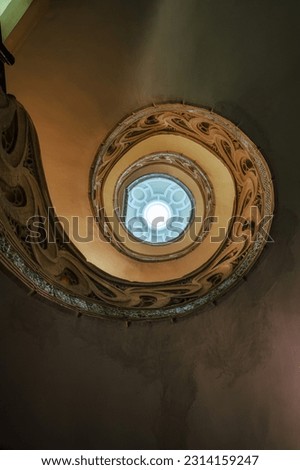 Ornate ancient spiral staircase of the Catholic Catedral de Santa Maria la Real, 15th Century Gothic Cathedral. Pamplona, Navarre. Spain Royalty-Free Stock Photo #2314159247