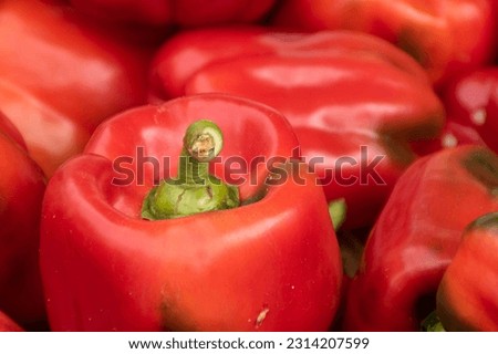 A group of red delicious peppers