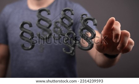 The male man holding the paragraph symbols with his fingers. Jurisprudence concept
