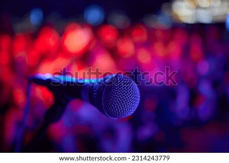 Retro microphone on stage in a pub or American Bar restaurant during a night show.