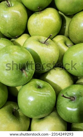 Granny Smith apples grouped together. Royalty-Free Stock Photo #2314249293