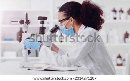 Microscope, sample analysis and woman scientist in a lab for science, covid and research. Laboratory, innovation and female health expert checking corona, medicine or results while working on a cure