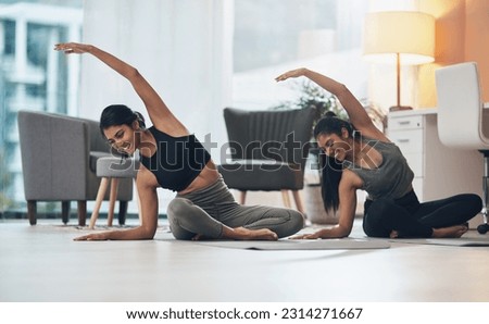 Women, yoga exercise and friends together in a house with happiness, health and wellness. Indian sisters or female family on lounge floor for stretching workout, balance and fitness with partner Royalty-Free Stock Photo #2314271667