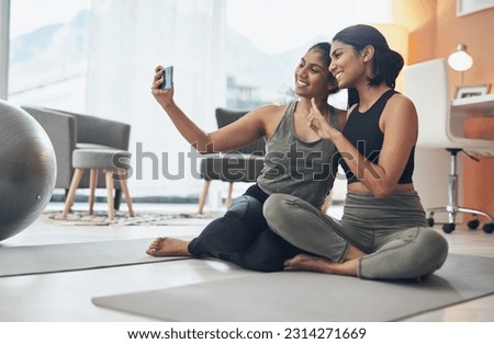 Exercise, peace sign and selfie of women together at home for social media blog post. Indian sisters, female friends and in lounge for online influencer update, fitness photograph and happy emoji
