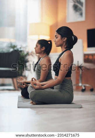 Friends, meditation and zen women together in a house for mindfulness, health and relax wellness. Indian sisters or female family meditate in lounge for yoga, lotus and mental health balance at home Royalty-Free Stock Photo #2314271675