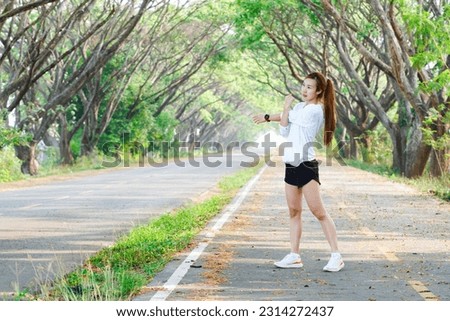 
Selective focus of Asian woman exercising, running, running in the midst of shady nature