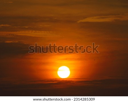 dusky view of the setting sun during sunset in the evening Royalty-Free Stock Photo #2314285309