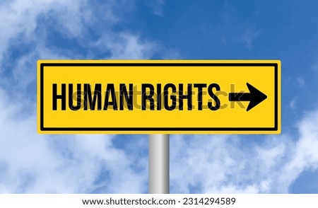 Human rights road sign on blue sky background