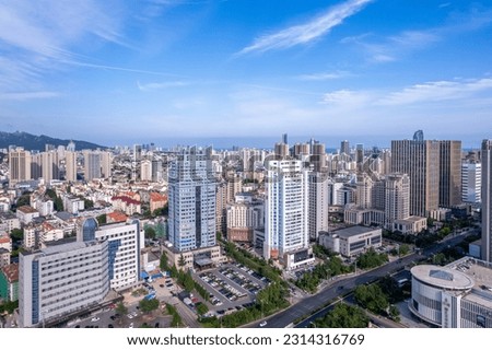 Aerial photo of urban landscape in Qingdao coastal bay area