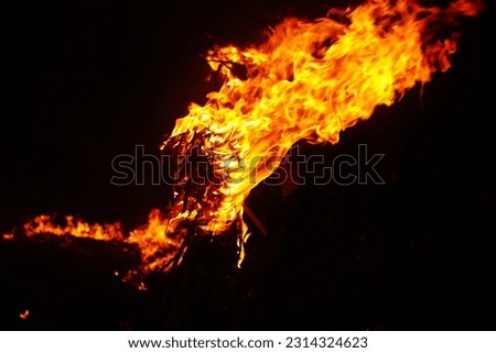Burning Flames With High on Black Backround