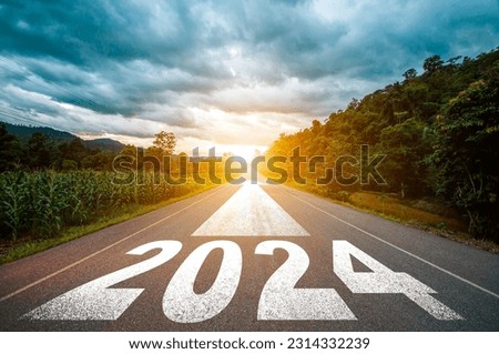 New year 2024 or straight forward concept. Text 2024 written on the road in the middle of asphalt road with at sunset. Concept of planning, goal, challenge, new year resolution.
 Royalty-Free Stock Photo #2314332239