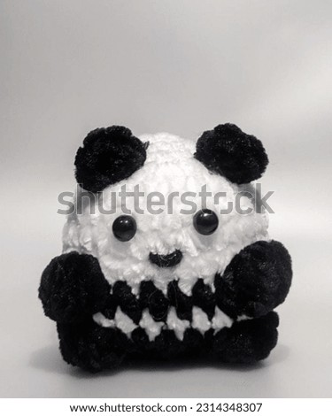 Little panda crochet doll's photo