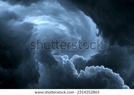 Dark sky during thunderstorm or dark clouds background Royalty-Free Stock Photo #2314352865