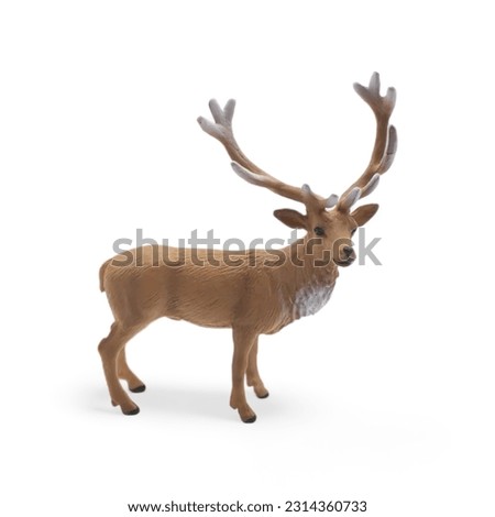 Close-up Toy stag miniature side view on White background