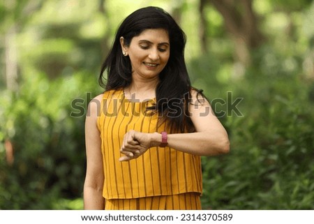 Indian happy women posing portrait in park