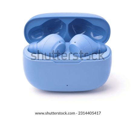 Front view of blue wireless earbuds in charging case isolated on white Royalty-Free Stock Photo #2314405417