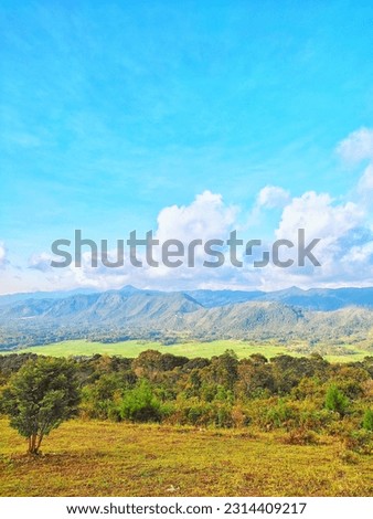 simago-mago mountains with blue sky and cool breeze