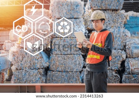 Engineers utilize reuse technology to minimize waste and promote sustainable practices in various industries, Co2, Green energy, Ecology. Royalty-Free Stock Photo #2314413263