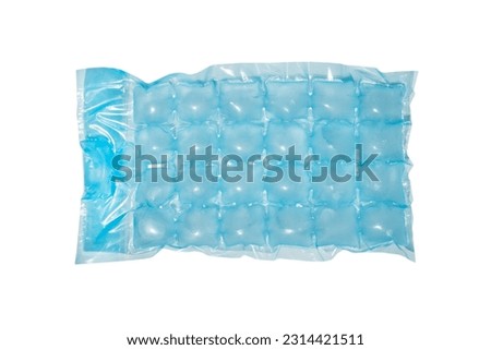 Blue plastic packaging ice bags for home water freezing isolated on white background. Ice cubes in plastic bag texture background. Freezer for ice circle cubes Royalty-Free Stock Photo #2314421511