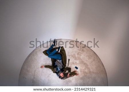 girl lies on the floor feeling of disaster