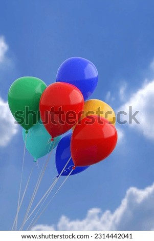 Colorful fun balloons flying over sky background