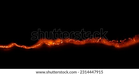 burning paper, glowing edge of paper on a black background Royalty-Free Stock Photo #2314447915