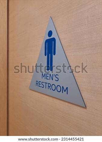 men's restroom sign in office 