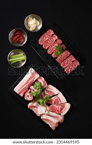 Korean BBQ, raw meat dish on the table Royalty-Free Stock Photo #2314469195