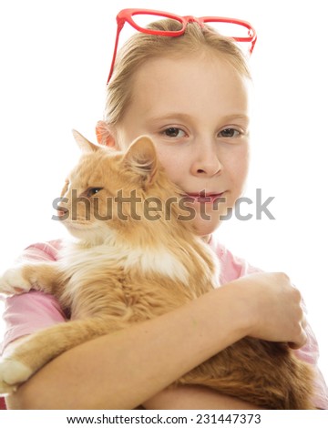 A girl with a cat in her arms on a white background.